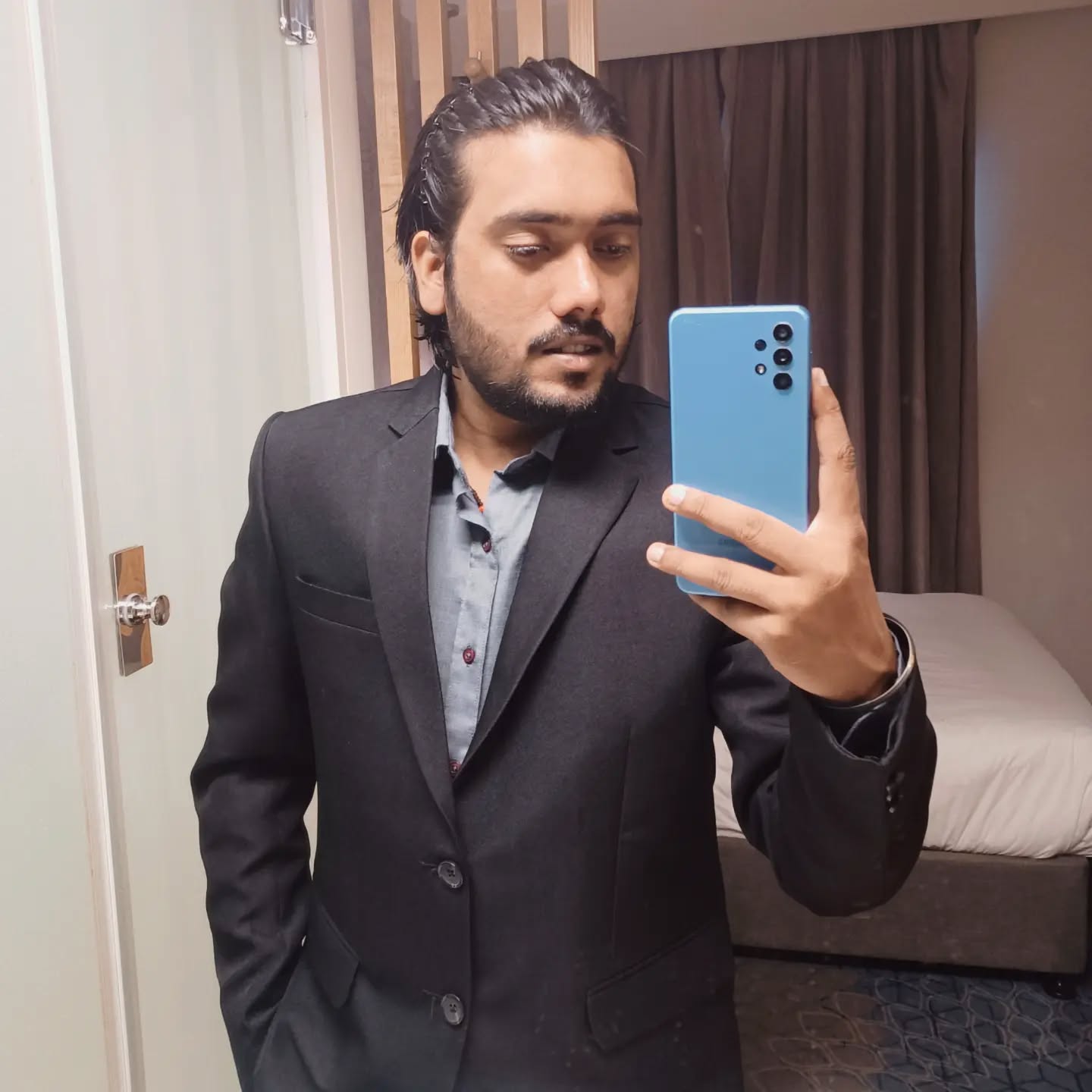 Rohit Chouhan in black coat hyderabad